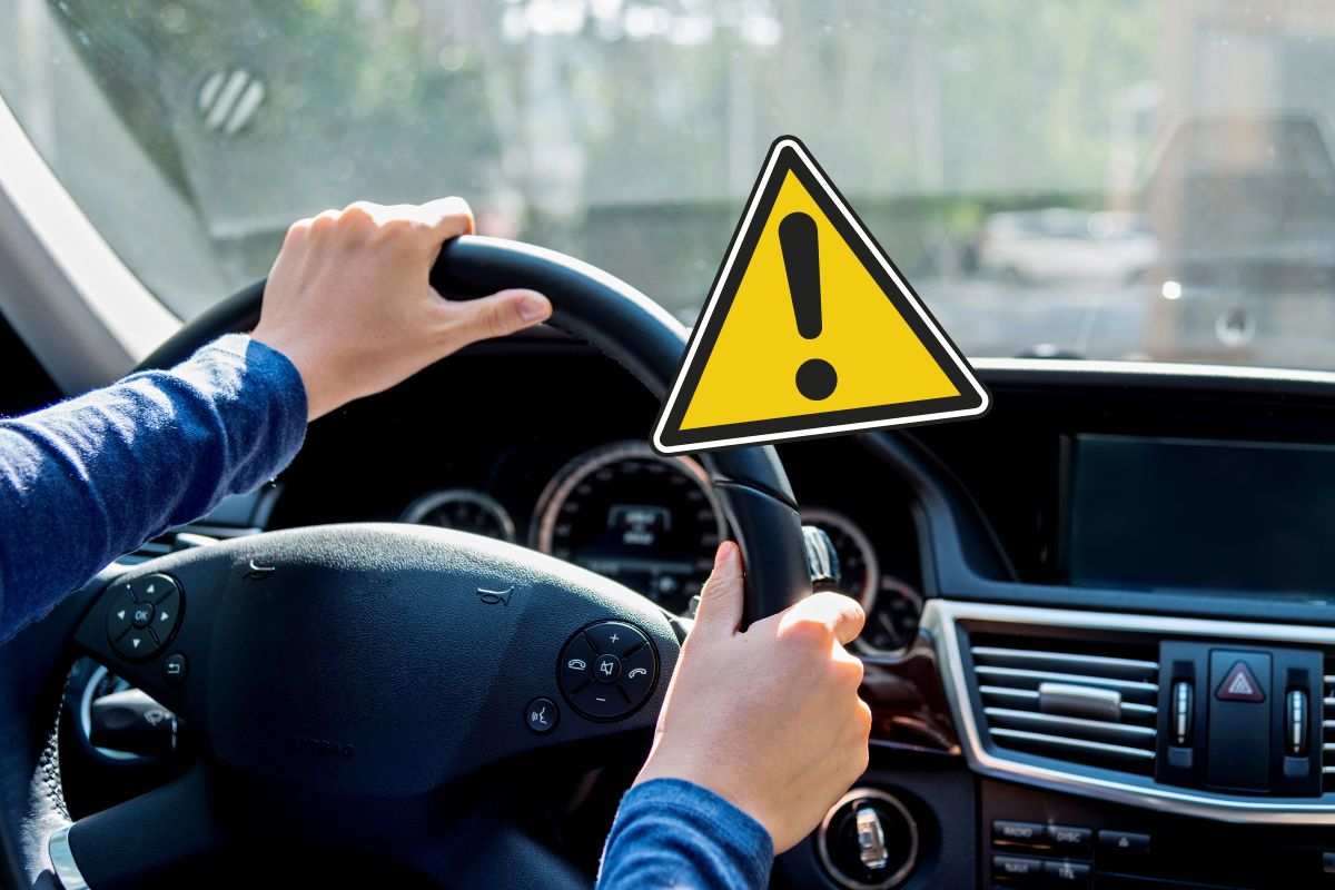 Automobilista guida in città