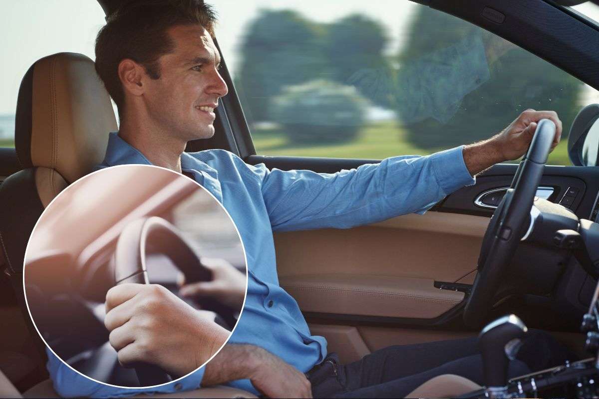 Uomo guida con una mano sul volante